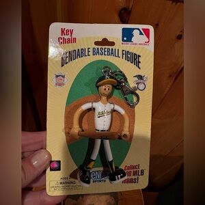 vintage Oakland Athletics "Lil' Sports Brat" bendable baseball figure keychain.